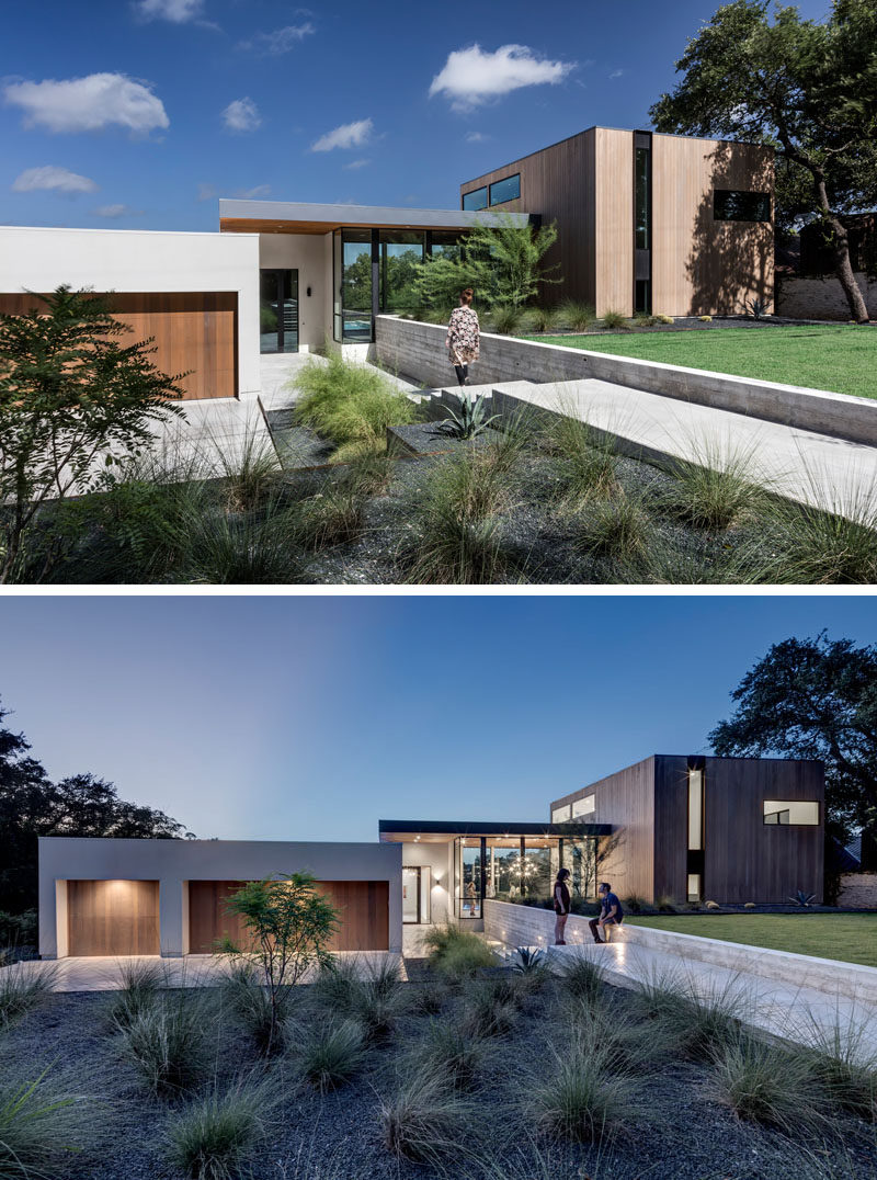 At the front of this home, a concrete path surrounded by landscaping leads you down to the front door. To the left are the garages and driveway, and to the right is the dining area and media room.