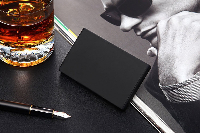 A minimal matte black pocket business card holder looks far more sophisticated and professional than fishing around through a bag and pulling out a crinkled card. #GiftIdeas #Architect #InteriorDesigner #BusinessCardHolder #ModernGiftIdeas