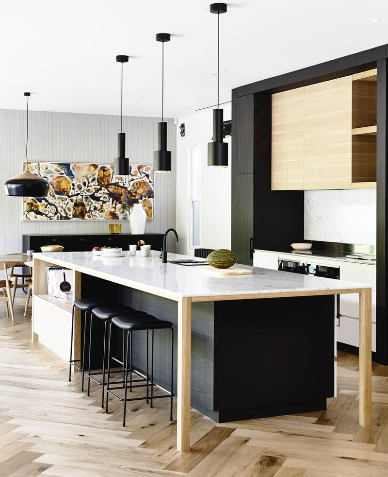 16 Inspirational Pictures Of Herringbone Floors // The natural look of the herringbone flooring in this kitchen fits right in with the rest of the light wood throughout.