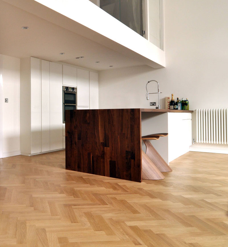 16 Inspirational Pictures Of Herringbone Floors // The wood herringbone in this apartment helps keep it both bright and cozy.