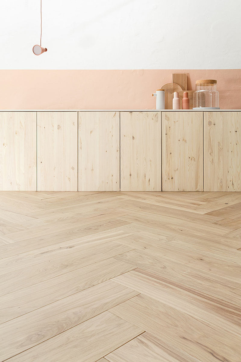 16 Inspirational Pictures Of Herringbone Floors // This light wood flooring matches the cupboards perfectly.