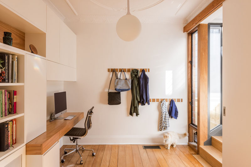 This small home office is built into the entryway of this home.