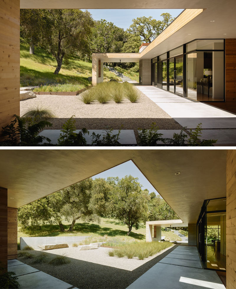 This 'L' shaped home has a large landscaped area with organized landscaping.