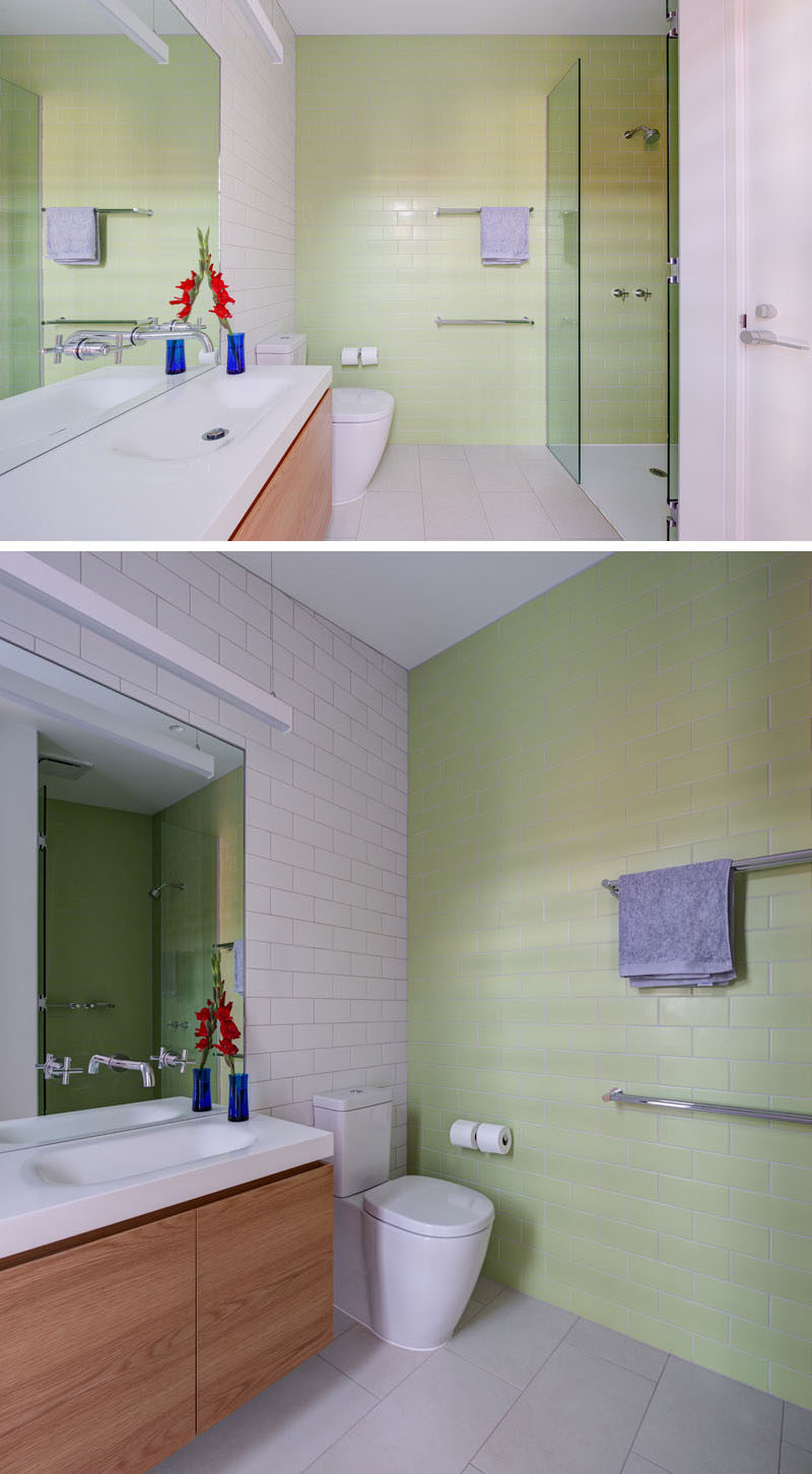 Pastel green subway tiles cover the wall in this contemporary bathroom.