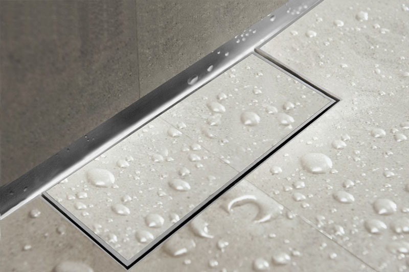 Bathroom Design Idea - Include A Linear Shower Drain // Linear shower drains, also known as infinity shower drains, are drain systems that lie flush with the floor and almost seem to disappear completely. #LinearShowerDrain #InvisibleShowerDrain #BathroomDesign #ShowerDesign #ShowerDrain