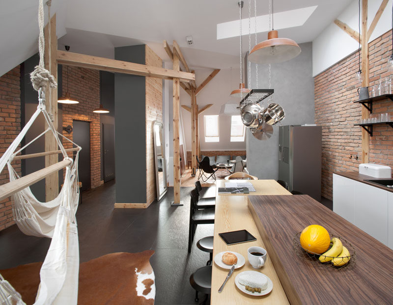 This loft in an old nineteenth century building in Poland was transformed into a contemporary apartment.