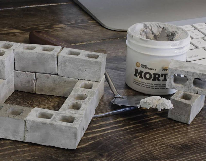 These mini cinder blocks let you create small buildings and structures that can either be secured forever or knocked down and built up over and over. #GiftIdeas #Architect #InteriorDesigner #ModernGiftIdeas