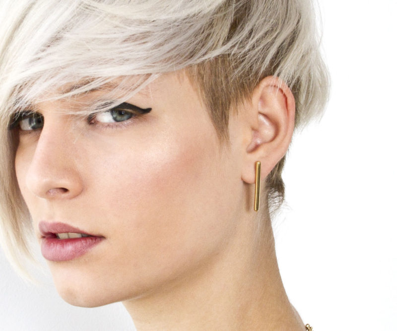 The Ultimate Gift Guide For The Modern Woman (40 Ideas!) // Simple gold line earrings a bit of extra flair to a basic outfit and can be worn as an everyday accessory. #ModernEarrings #MinimalistEarrings