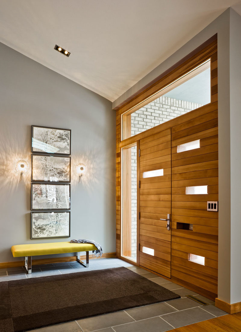 Entryway Design Ideas - 3 Different Styles Of Entryway Benches // This yellow bench adds a pop of color to the entryway and makes the perfect place to sit while you pull on your boots or sneakers.