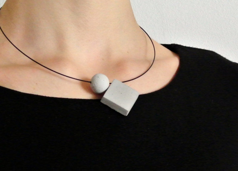 The Ultimate Gift Guide For The Modern Woman (40 Ideas!) // Concrete geometric pendants on a matte black necklace make a simple statement and can be dressed up and down. #ConcreteNecklace #GiftIdeas