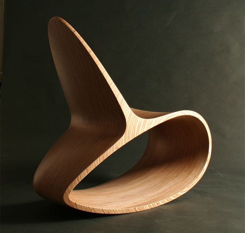 This sculptural wood rocking chair is both a stylish seating solution and a piece of modern artwork. #ModernRockingChair #RockingChair #SeatingDesign #FurnitureDesign