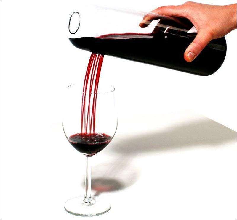 10 Unique Modern Wine Decanters // A number of small holes in the side of this decanter creates a unique pouring experience and helps to aerate the wine even more when it's being poured.