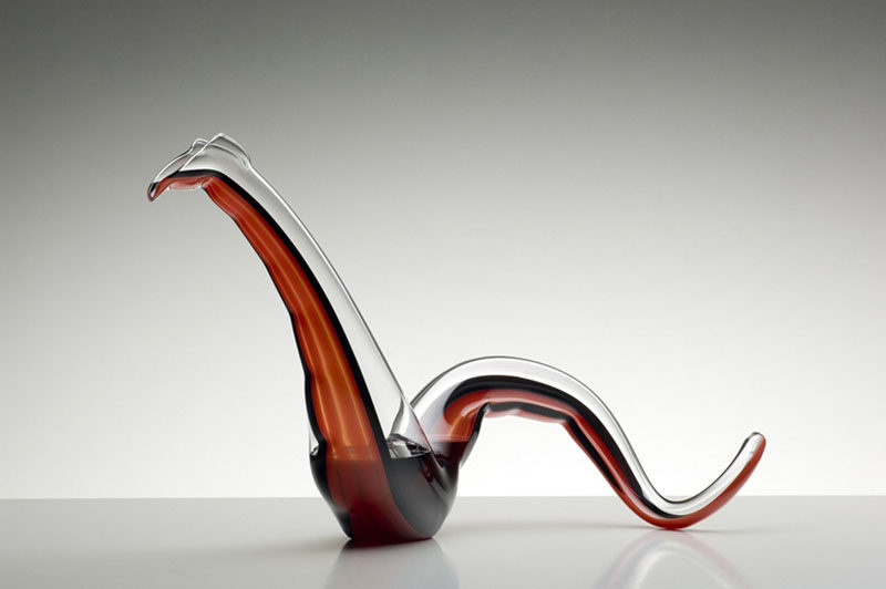 10 Unique Modern Wine Decanters // A red stripe runs down the center of this crystal decanter emphasizing its serpent-like form.