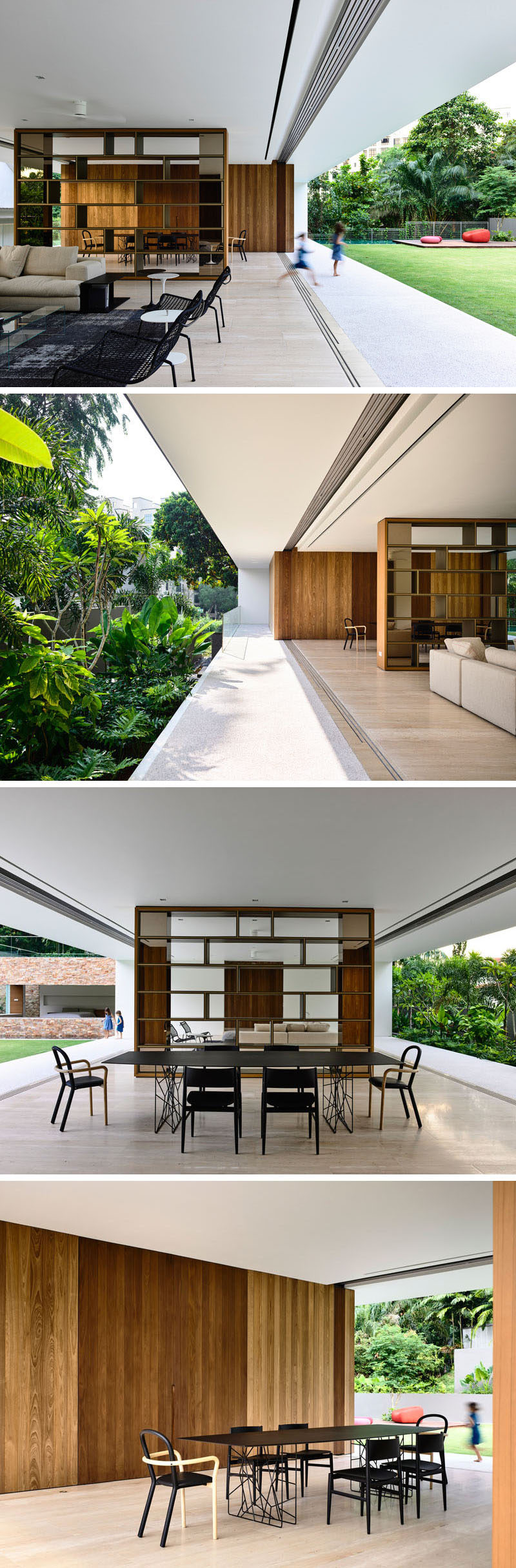 The living and dining room share the open floor plan in this home, with a large bookshelf divider helping to define the areas.