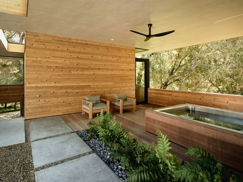This home in California has a covered outdoor area for a spa that's located just off the guest suite.