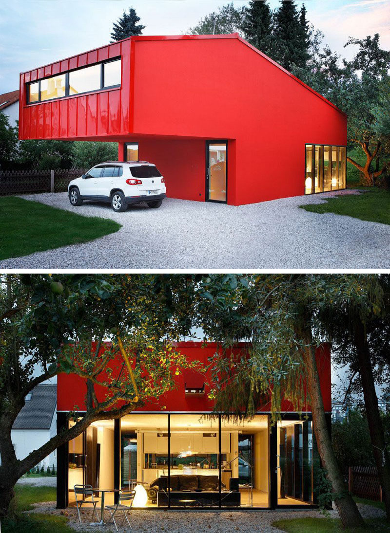 11 Red Houses And Buildings That Aren't Afraid To Make A Statement // A mix of matte and shiny red make up the exterior of this modern, angular home.