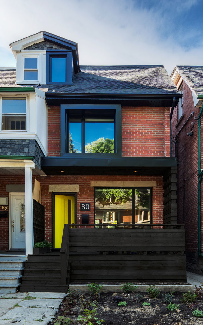 Post Architecture have updated this semi-detached home in Toronto, Canada, that was originally a mirror image of its attached neighbor.