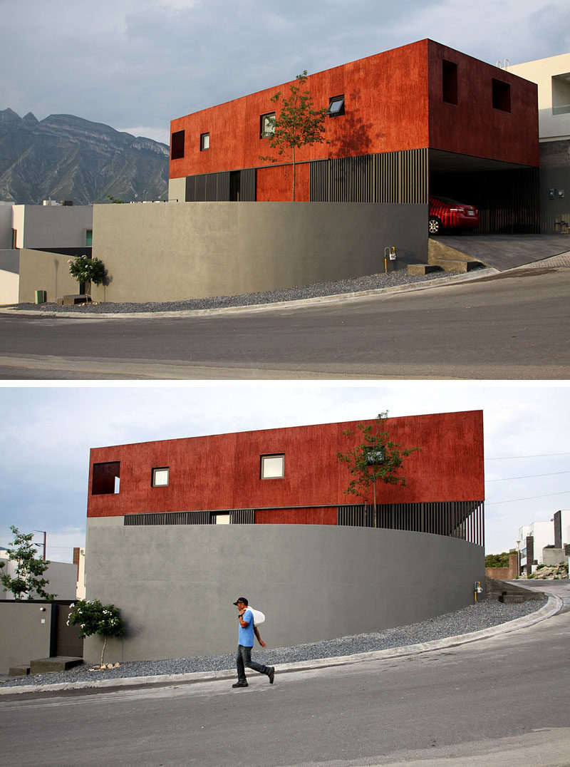 11 Red Houses And Buildings That Aren't Afraid To Make A Statement // This rusty-red house definitely stands out on the corner of this street.