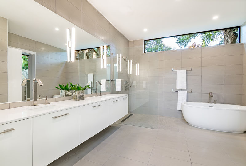 In this bathroom the colors have been kept neutral, adding to the light and airy feeling of the home.