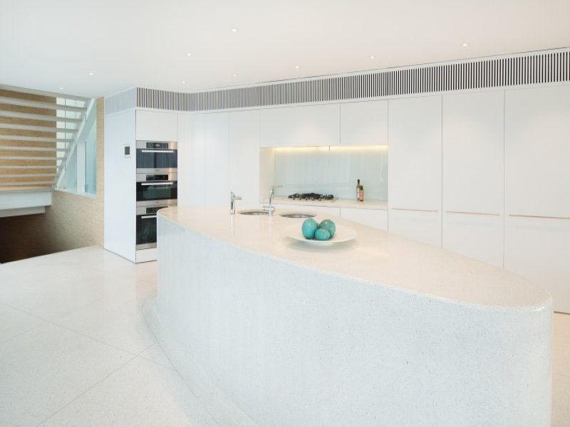 Kitchen Design Ideas - White, Modern and Minimalist Cabinets // Everything except for the appliances is white in this super clean, bright kitchen.