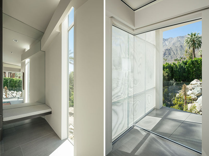 This master bedroom has a variety of windows to add natural light and to enjoy the mountainous views.