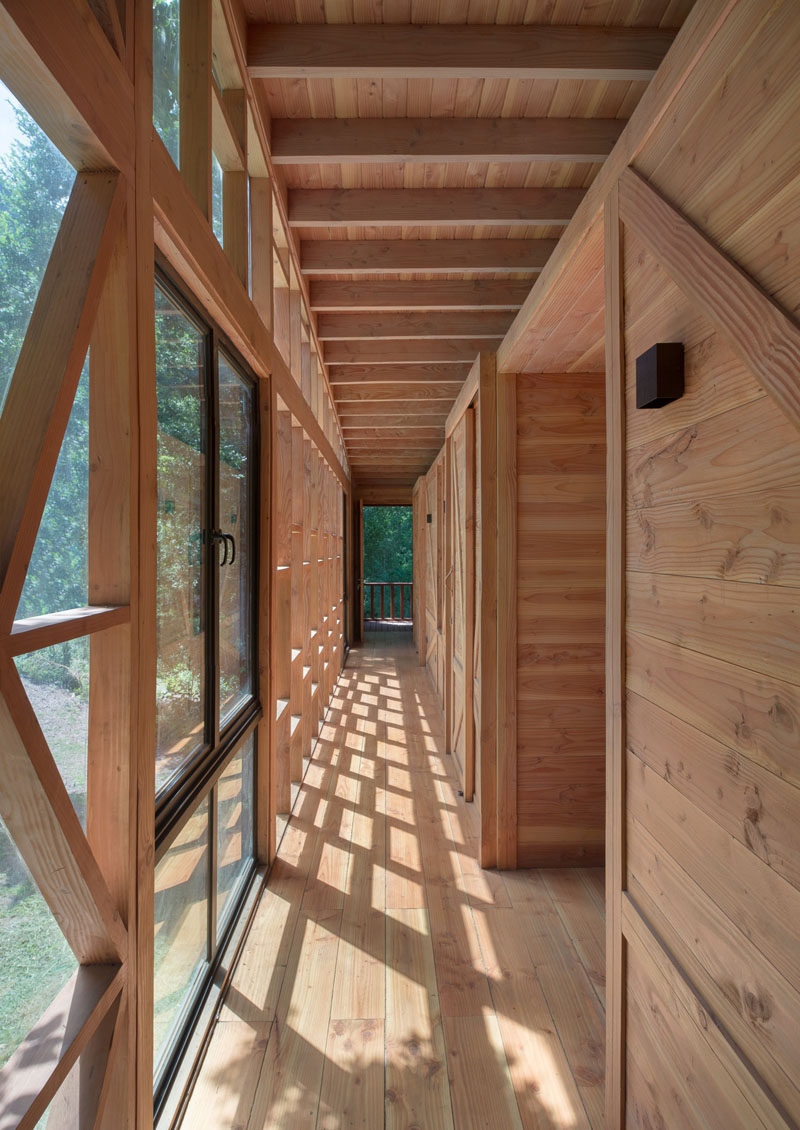 Timber construction gives this home a wood cabin feel.