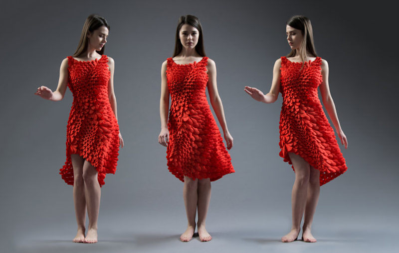 3D PRINTED FASHION - This flowing red dress was inspired by petals, feathers, and scales. It was 3d printed using durable nylon plastic.