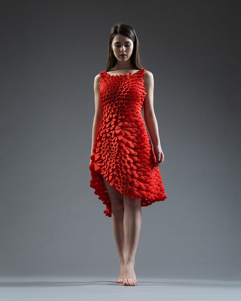 3D PRINTED FASHION - This flowing red dress was inspired by petals, feathers, and scales. It was 3d printed using durable nylon plastic.