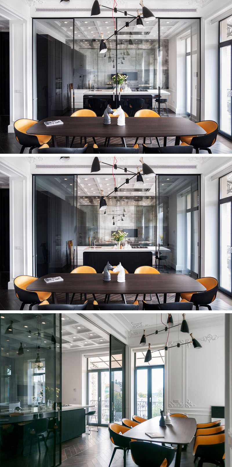 This kitchen is hidden behind tinted siding glass doors, allowing for the kitchen to be closed off from the rest of the space. On the back wall of the kitchen there's a artificially aged mirror that hides a television behind it.