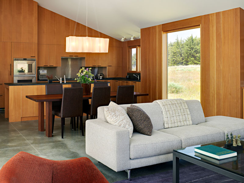 The main living area of this home has been designed as one room, with the kitchen, dining and living room all sharing the same space.