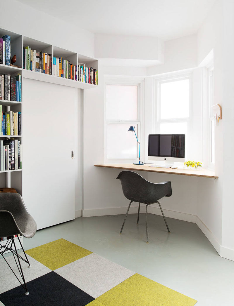 A wall desk installed under a window makes the most of natural light lets you look out the window while you work.