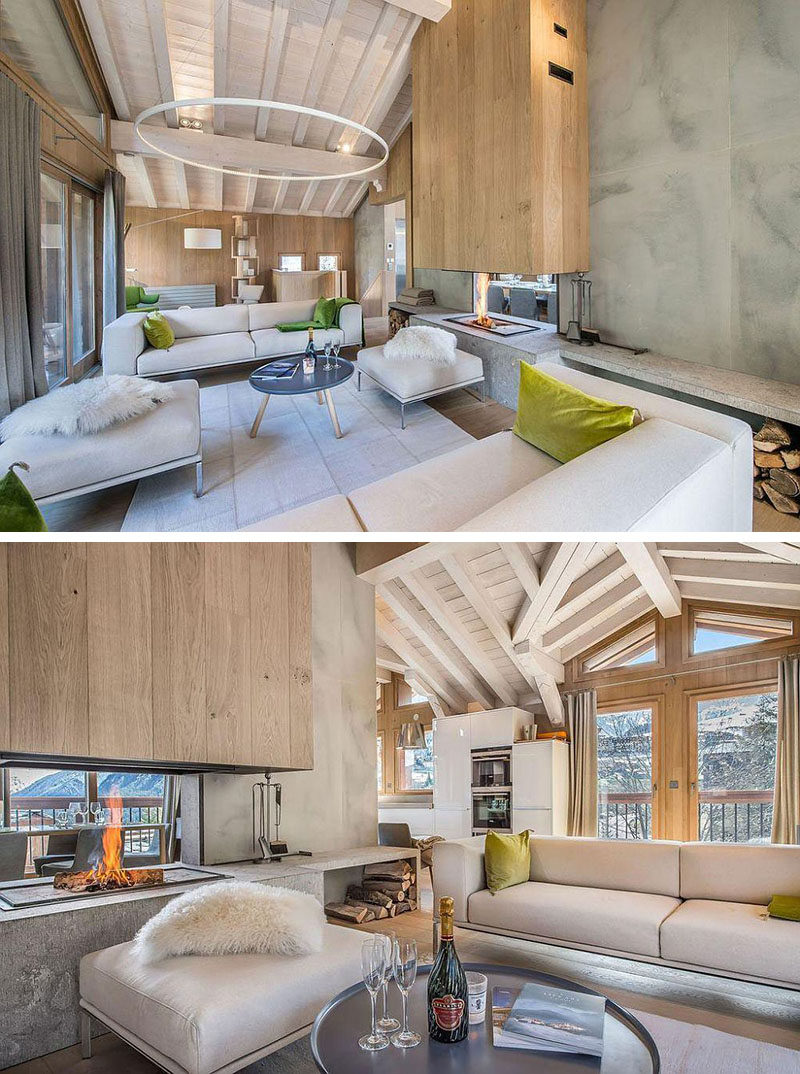 DOUBLE-SIDED FIREPLACE IDEA - This chalet has a contemporary interiors with separate dining and living areas, however they both get to enjoy the warmth of the double-sided fireplace.