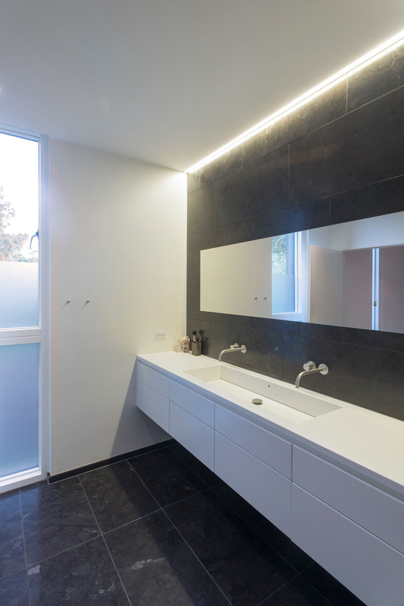 Bathroom Design Idea - Extra Large Sinks Or Trough Sinks (20 Pictures) // This extra long sink fits right in to the extra long countertop and gives each person plenty of space to get ready.