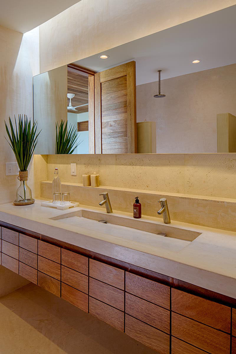 Bathroom Design Idea - Extra Large Sinks Or Trough Sinks (20 Pictures) // Two people can easily get ready at the same time in this bathroom thanks to the extra long sink that creates a convenient double vanity.