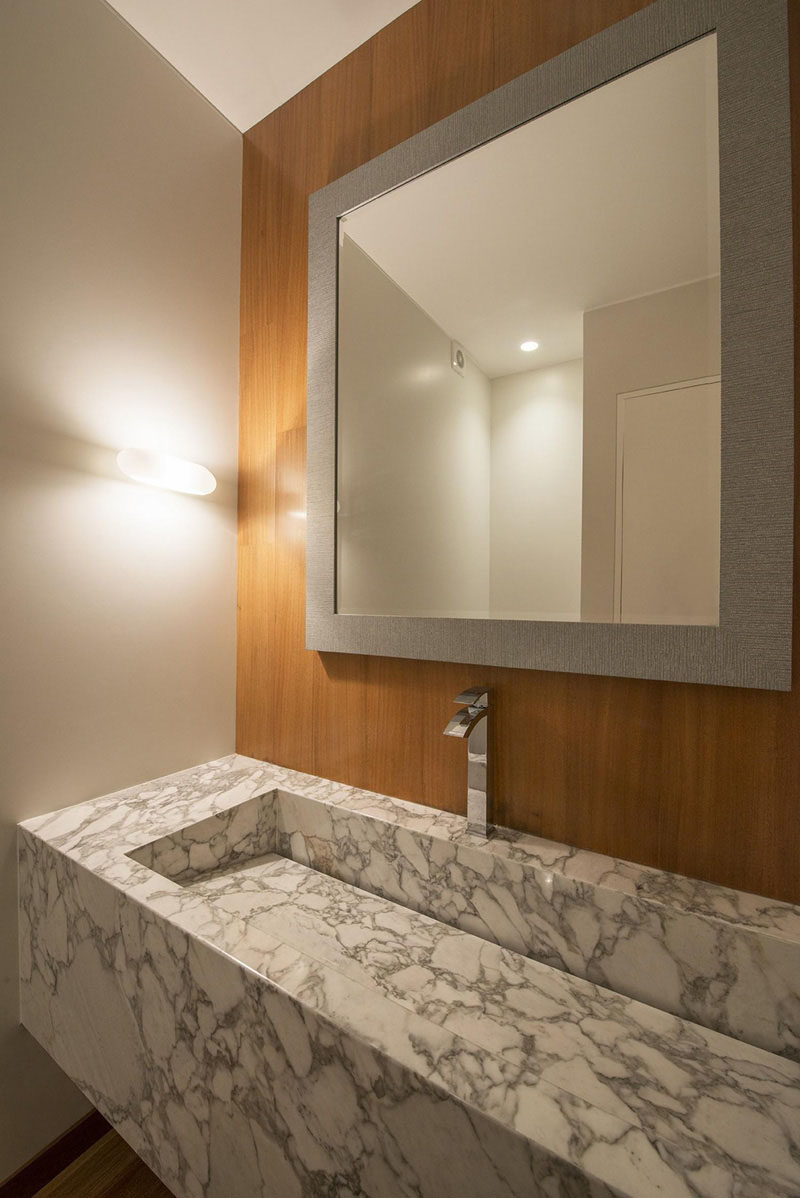 Bathroom Design Idea - Extra Large Sinks Or Trough Sinks (20 Pictures) // This marble trough sink features an invisible drain that allows for a seamless and stylish design.