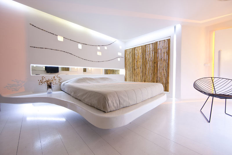 Hotel Room Design Ideas To Use In Your Own Bedroom // Create the illusion of a floating bed.