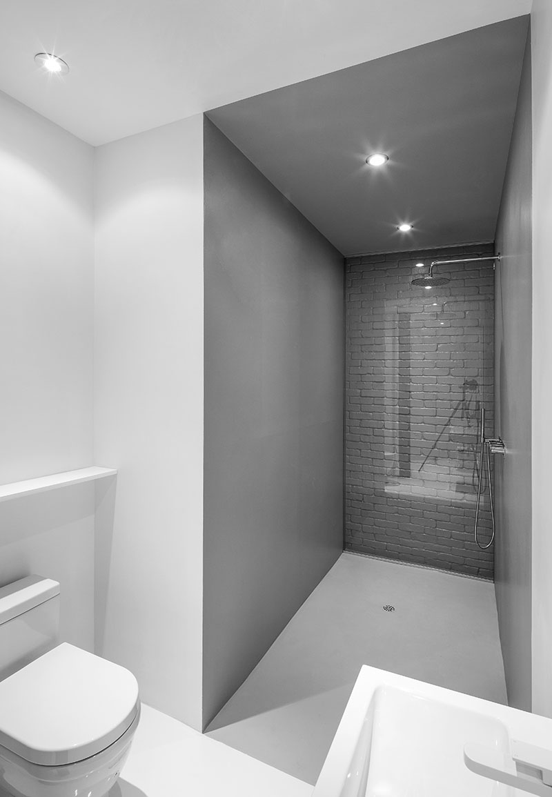Bathroom Design Idea Use Glass To Cover An Original Brick Wall And