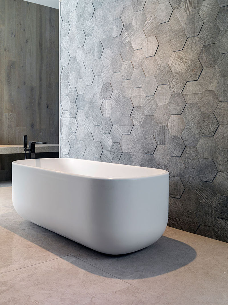 Bathroom Tile Ideas - Grey Hexagon Tiles // These grey hexagonal wall tiles stick out slightly from the wall to create a textured honeycomb look.