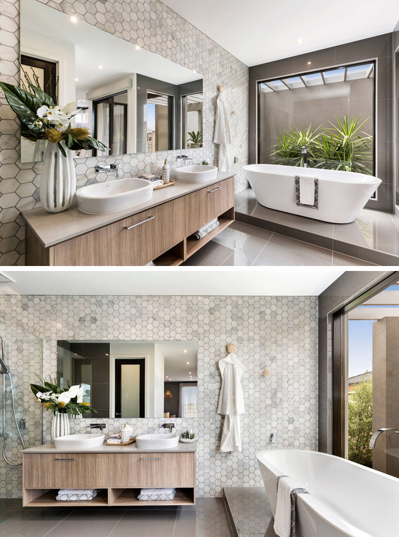 Bathroom Tile Ideas - Grey Hexagon Tiles // Grey and white marble hexagon tiles on the wall of this bathroom give the space a sophisticated and spa-like feel.