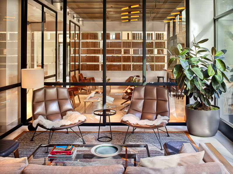 The communal areas of the Arlo Hudson Square hotel have been partitioned off with the same glass and black metal walls.