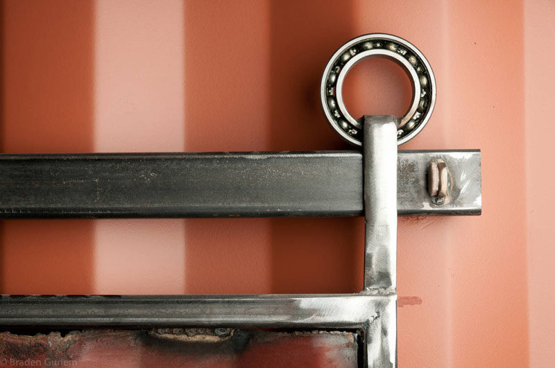 Interior Design Details - Industrial Close Ups // The dark color of the sliding door mechanism completes the industrial look in this shipping container home.