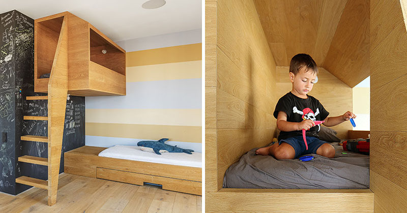 In this kids bedroom, there's a 'nest', an elevated wooden box or cubby that looks out over the rest of the bedroom and gives the children a quiet place to play.