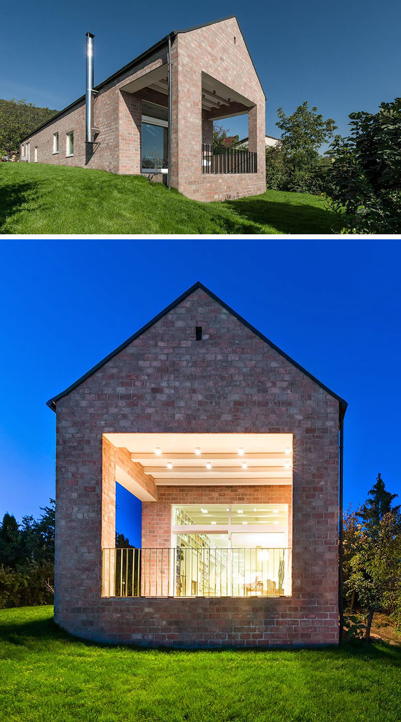 The brick covering this house give it a traditional look while the gabled roof keeps the design looking minimal and modern.