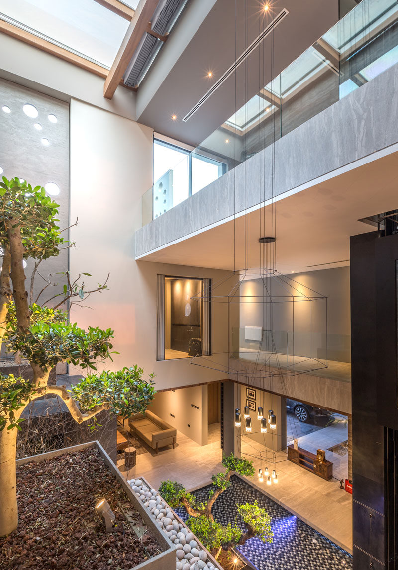 From the lounge area of the master suite in this modern house you are able to see the courtyard below and the skylight above. #Architecture #Courtyard