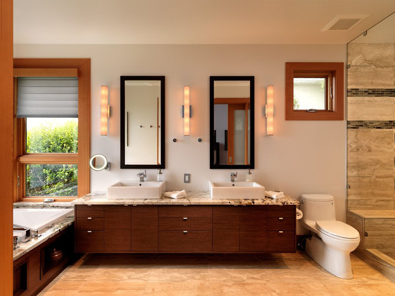 5 Bathroom Mirror Ideas For A Double Vanity // Two rectangular mirrors adds height to the bathroom and lets each person have their own space.