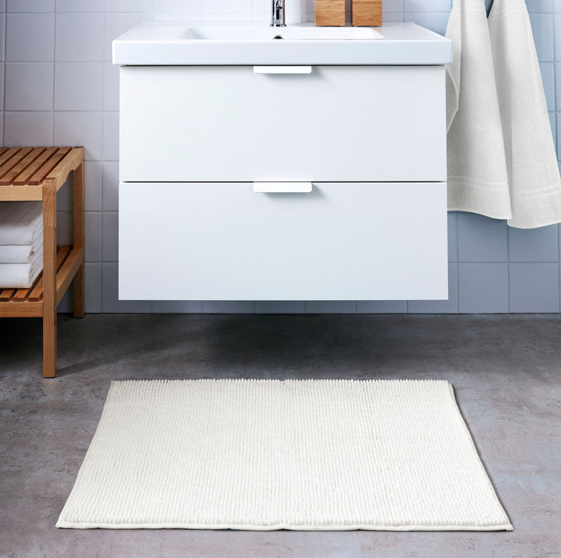 7 Things You Need To Create The Perfect Spa at Home // Bath Mats - Natural materials help warm up the bathroom and create a spa like atmosphere while plush materials make getting out of the bath just as comfortable as getting in.