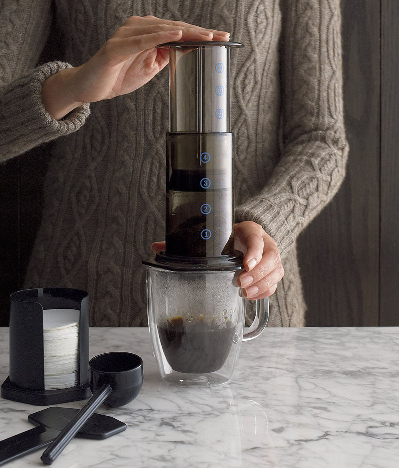 13 Modern Gift Ideas For Coffee Connoisseurs // The AeroPress coffee maker sits right on top of your mug and puts you in control of the whole coffee making process.