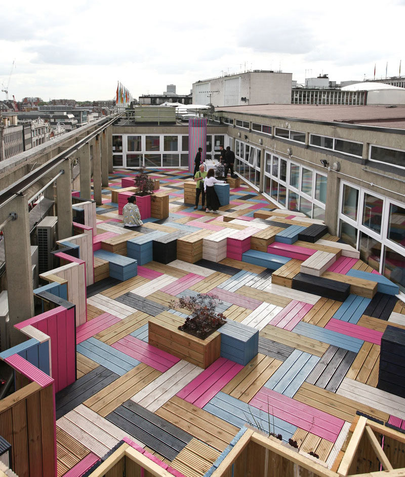 Deck Design Ideas - This Rooftop Deck Received A Colorful Modern Makeover For Its Wood Bench Seating And Planters