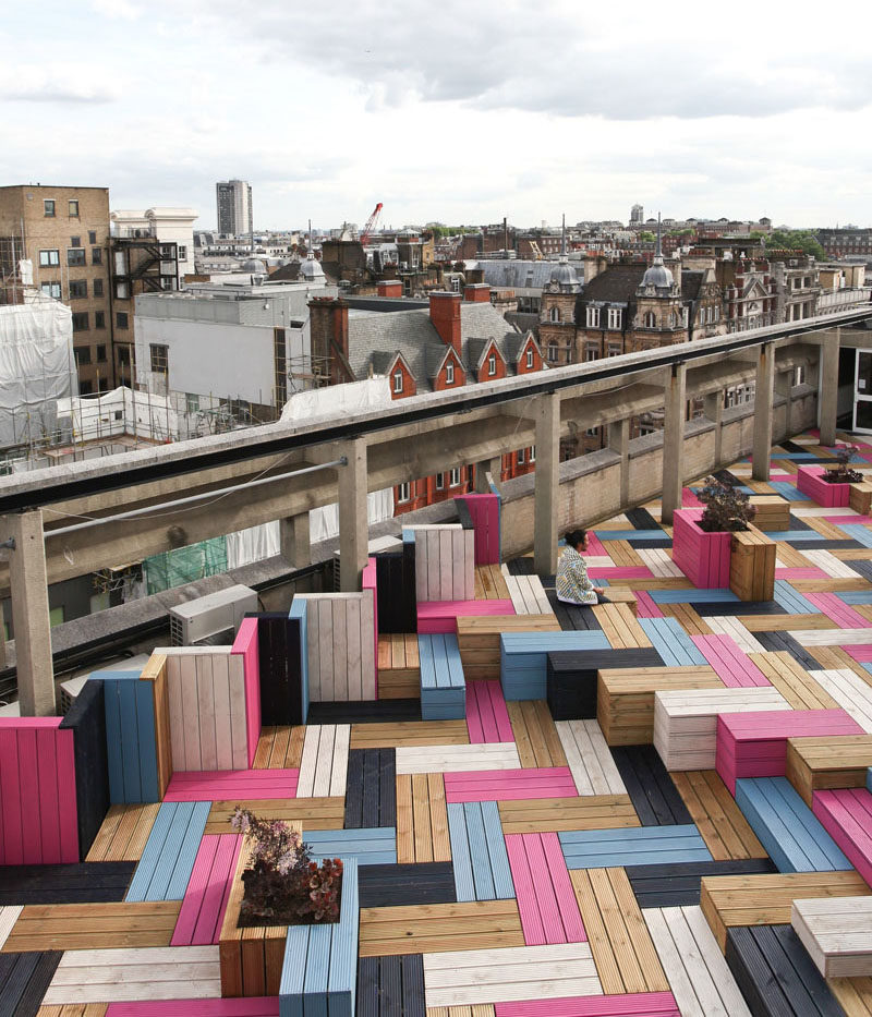 Deck Design Ideas - This Rooftop Deck Received A Colorful Modern Makeover For Its Wood Bench Seating And Planters