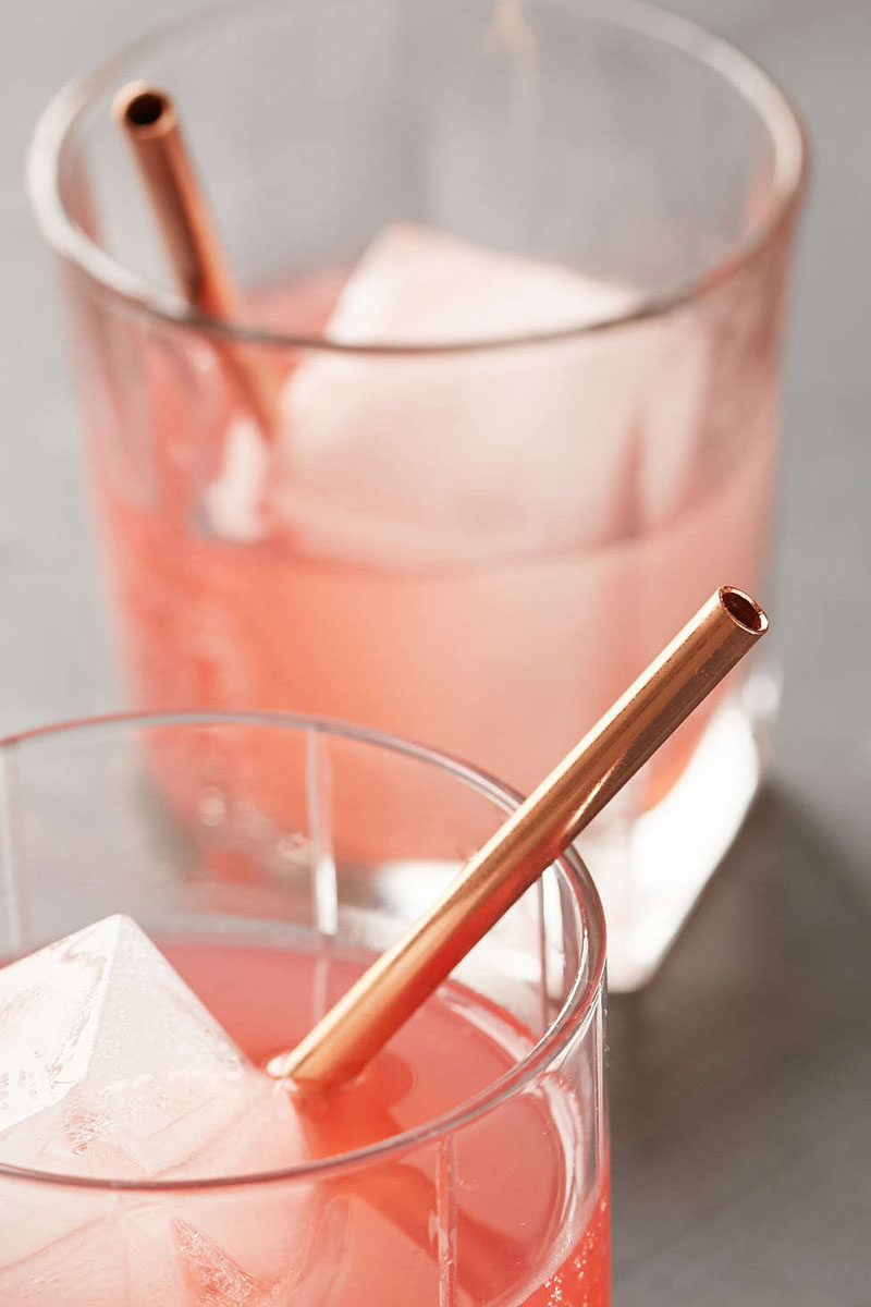 Kitchen Decor Ideas - 12 Ways To Add Copper To Your Kitchen // Reusable copper straws are both a stylish and environmentally friendly way to sip your drinks.